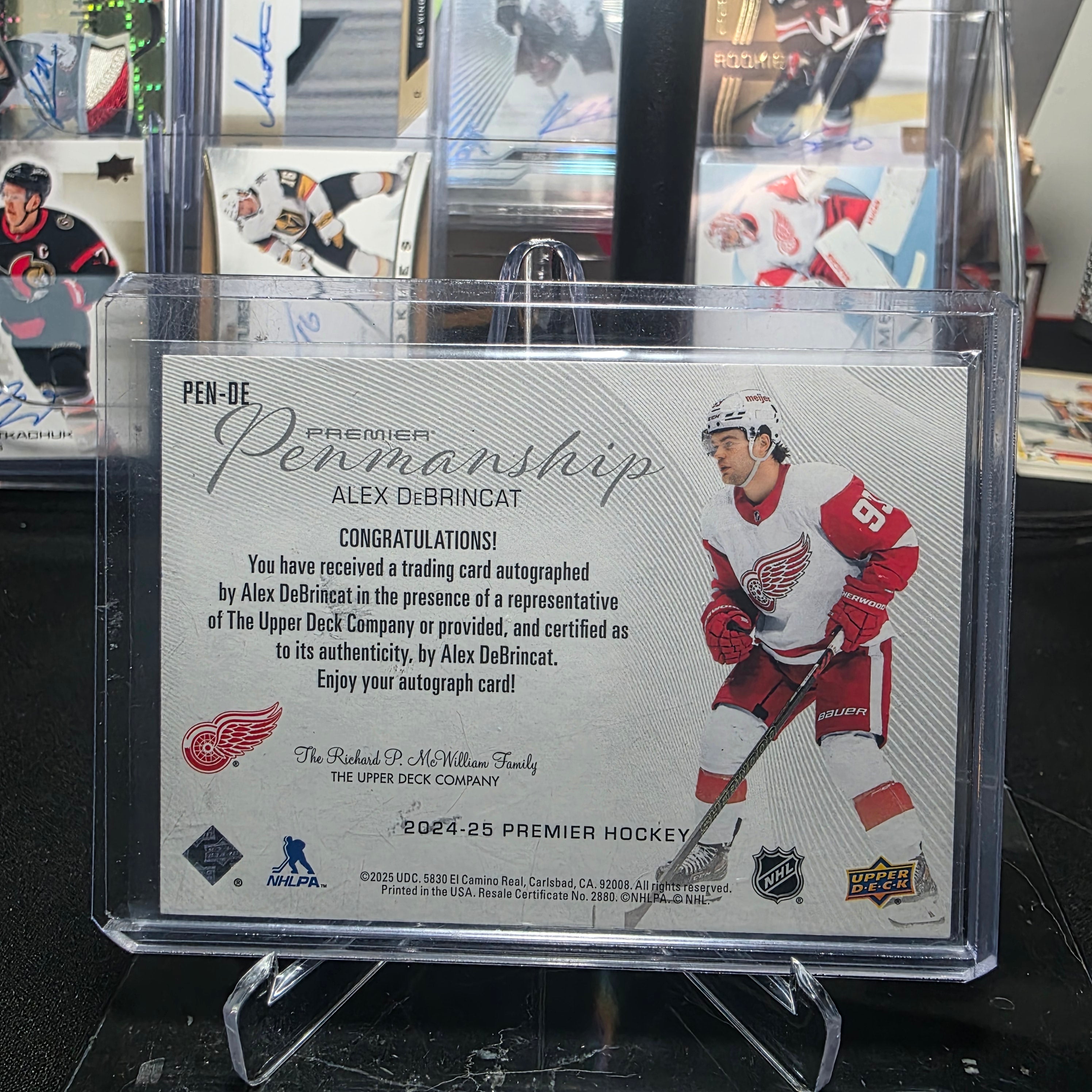 2024-25 Upper Deck Premier Hockey Alex DeBrincat Premier Penmanship Auto #PEN-DE (Detroit Red Wings)