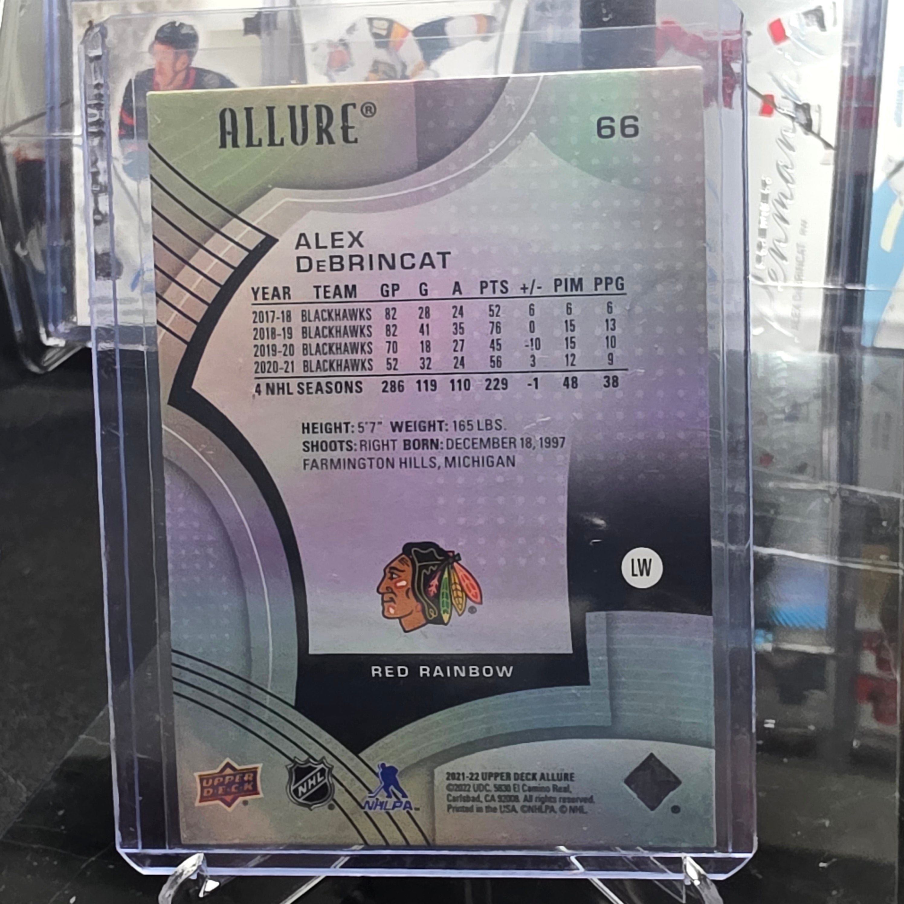 2021-22 Upper Deck Allure Alex DeBrincat #66 Red Rainbow Chicago Blackhawks