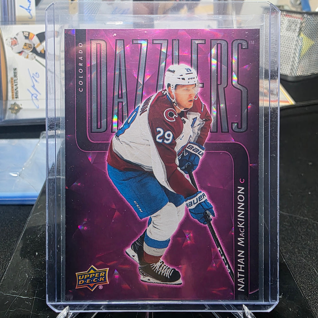 2025-26 Upper Deck Series 2 Nathan MacKinnon Dazzlers Pink #DZ-59 (Colorado Avalanche)