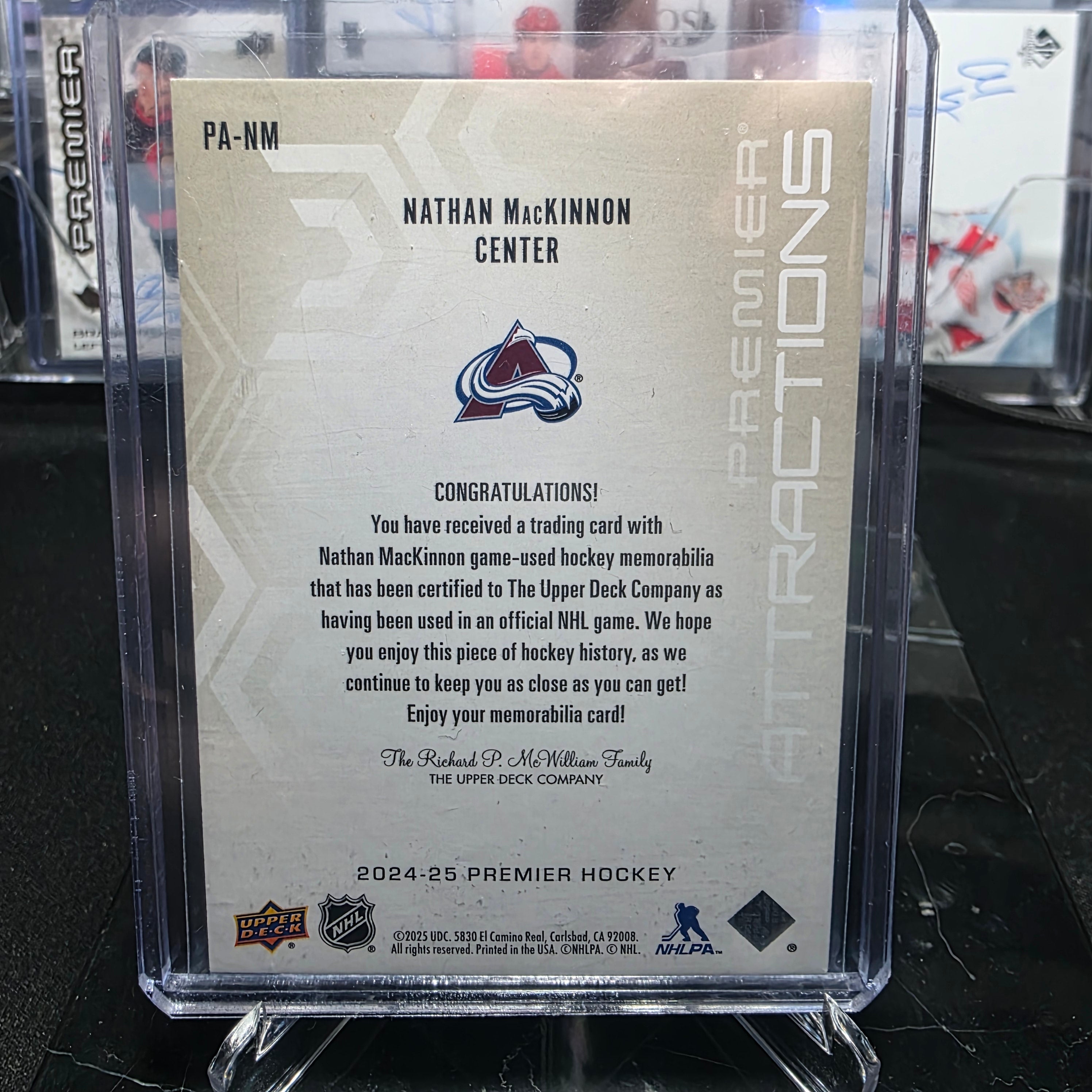 2024-25 Upper Deck Premier Nathan MacKinnon Premier Attractions Jersey PA-NM 03/49