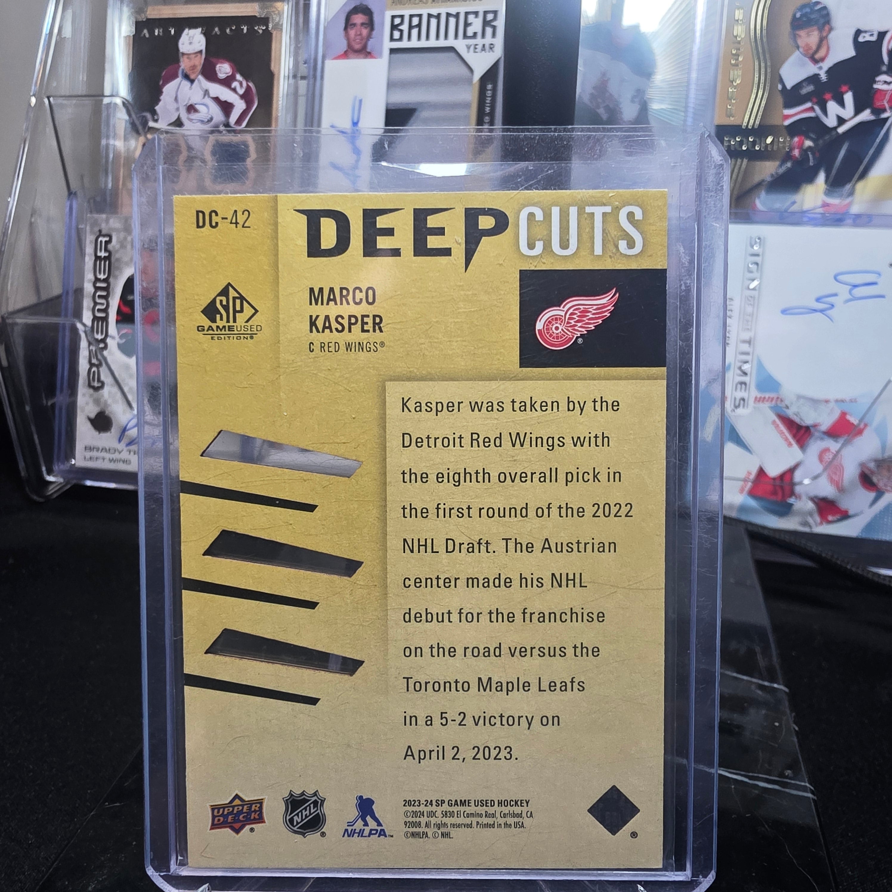 2023-24 SP Game Used Deep Cuts Gold DC-42 Marco Kasper Detroit Red Wings 022/250