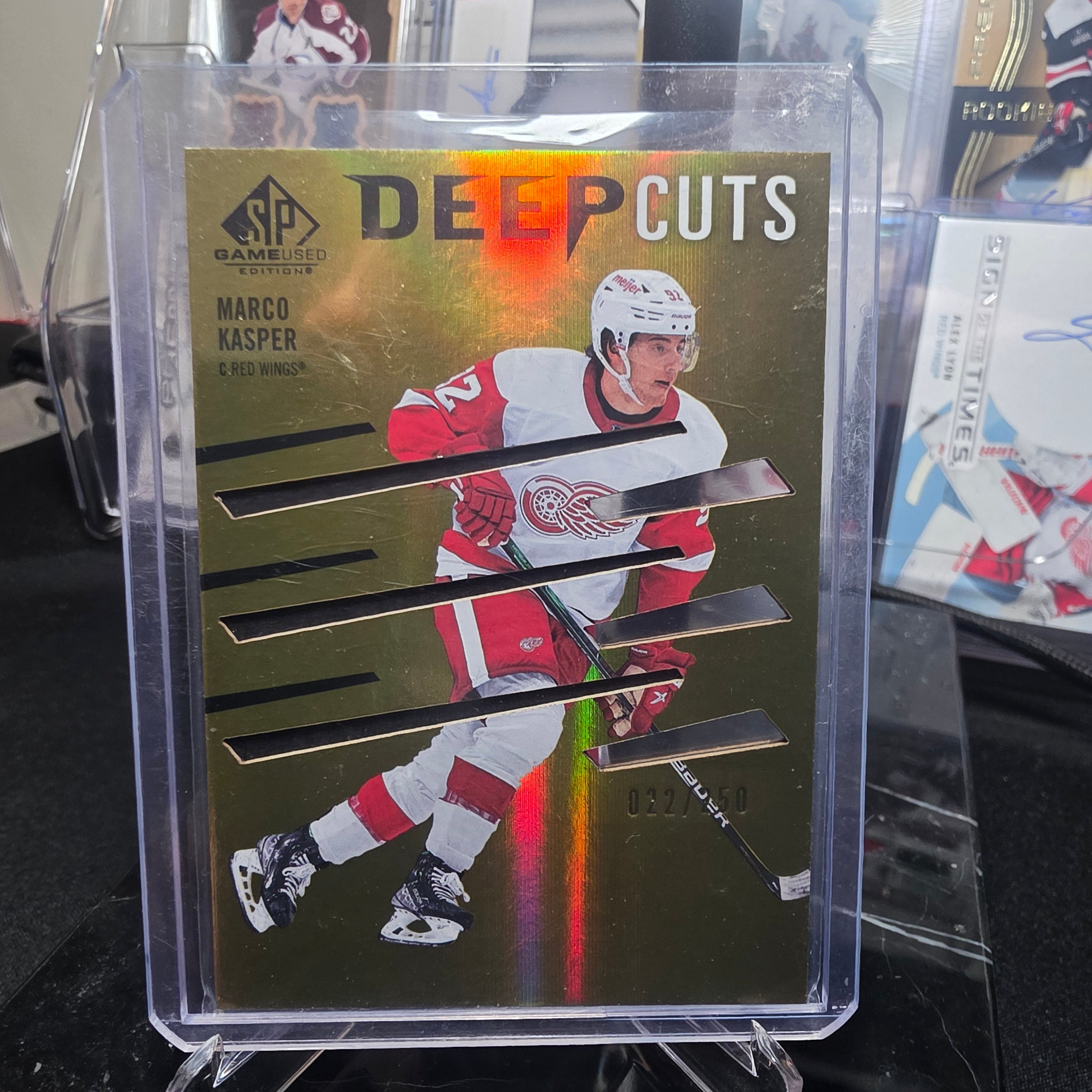 2023-24 SP Game Used Deep Cuts Gold DC-42 Marco Kasper Detroit Red Wings 022/250