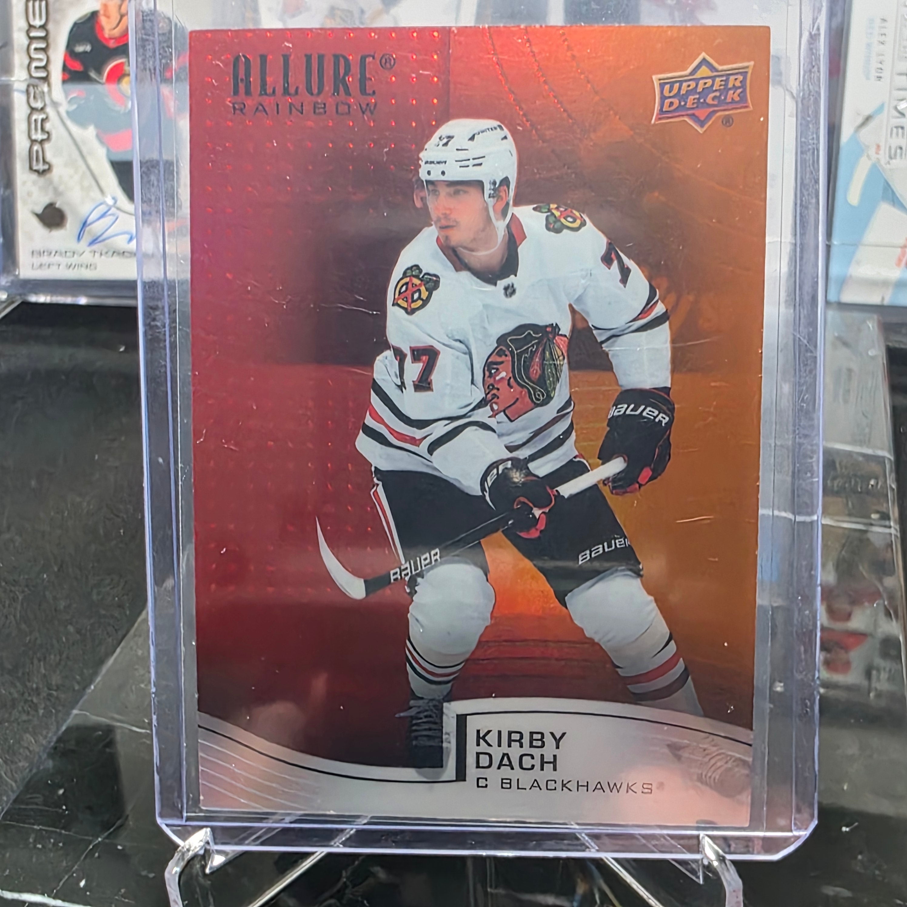 2021-22 Upper Deck Allure Kirby Dach #R-81 Red/Orange Rainbow Chicago Blackhawks