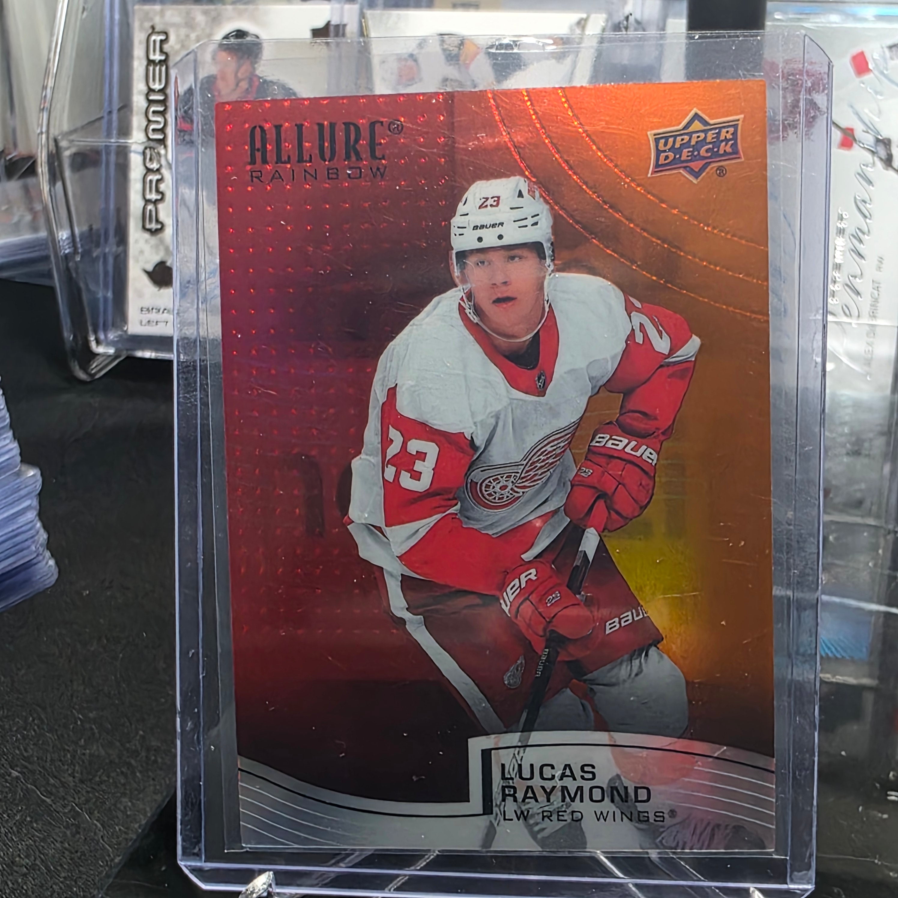 2021-22 Upper Deck Allure Lucas Raymond #R-6 Red/Orange Rainbow Detroit Red Wings